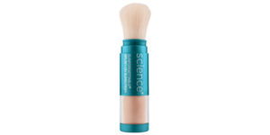A makeup brush with a teal handle and copper band near the bristles, labeled "science." the brush appears new with clean, soft, beige bristles.